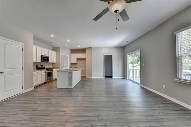 a view of kitchen with furniture and window