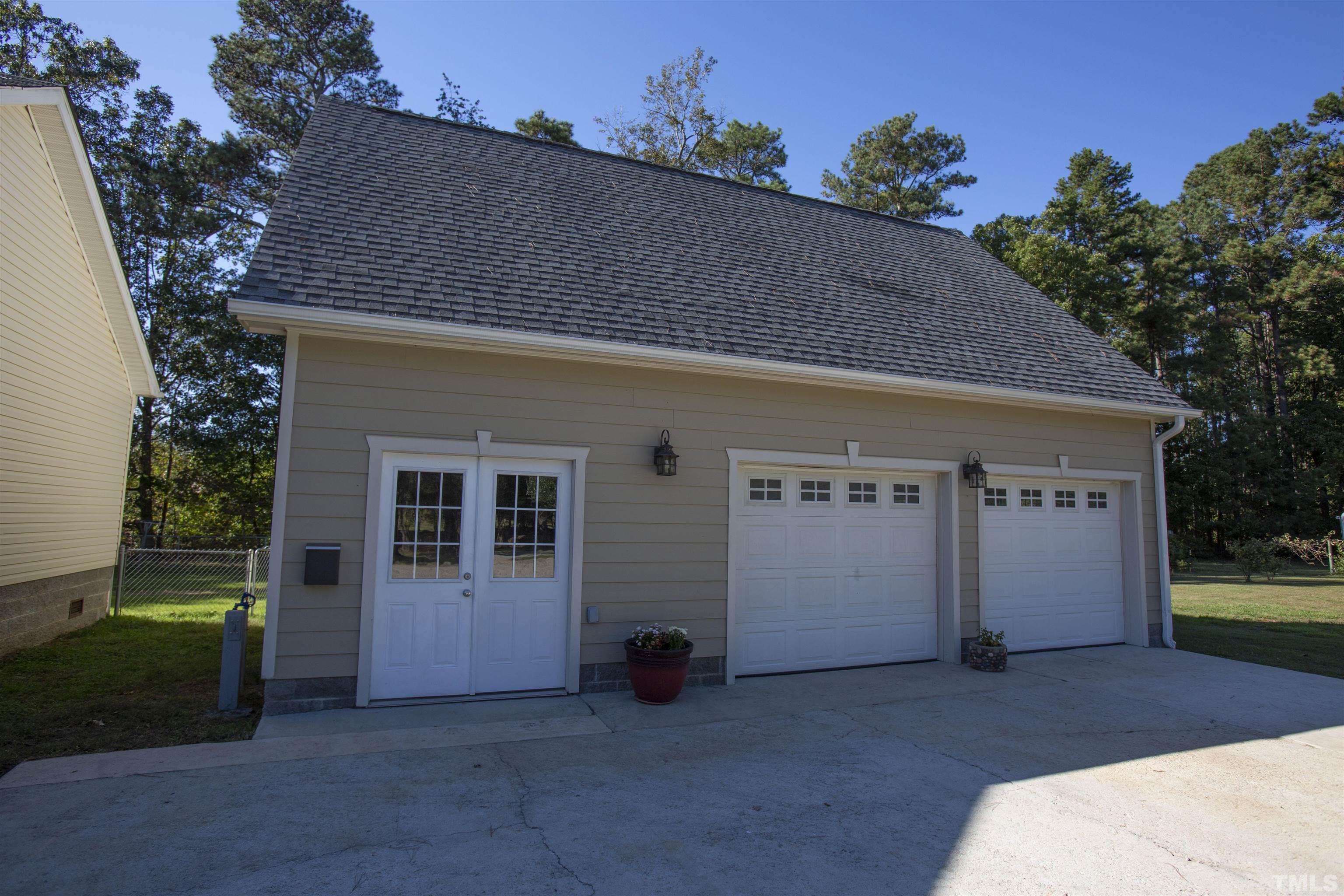 510 Vick Road Spring Hope, NC 27882 - Photo 22 of 29 a front view of a house with a yard