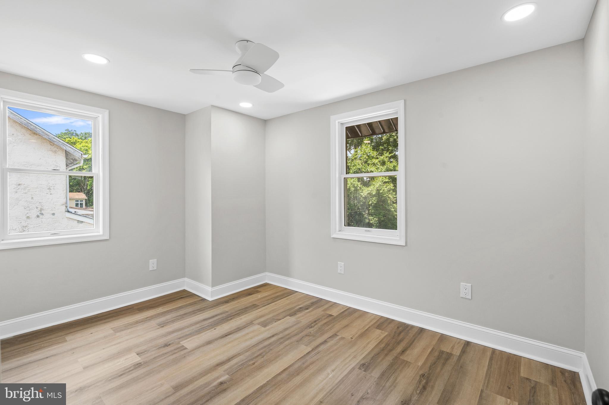 1082 Edge Hill Road Abington, PA 19001 - Photo 25 of 37 a view of an empty room with wooden floor and a window