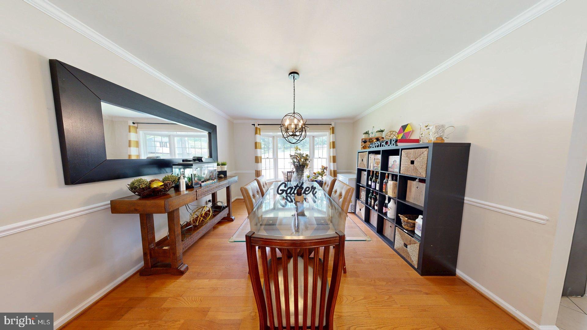 11901 Rustic Farm Court Germantown, MD 20874 - Photo 6 of 134 Elegant dining space for gatherings.