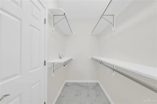 a view of a room with racks on the wall