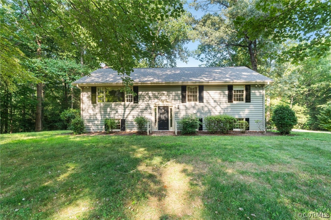 653 Purkins Road Tappahannock, VA 22560 - Photo 1 of 34 Bi-level home featuring a front yard