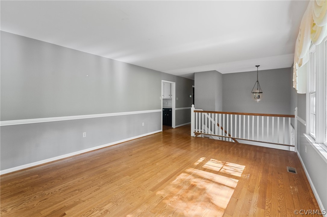 653 Purkins Road Tappahannock, VA 22560 - Photo 12 of 34 Empty room featuring light hardwood / wood-style f