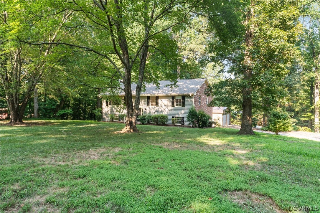 653 Purkins Road Tappahannock, VA 22560 - Photo 4 of 34 View of front of home with a front yard