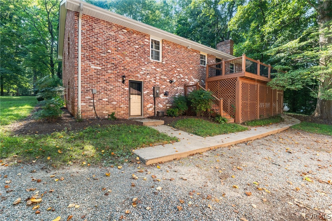653 Purkins Road Tappahannock, VA 22560 - Photo 5 of 34 Rear view of property with a deck