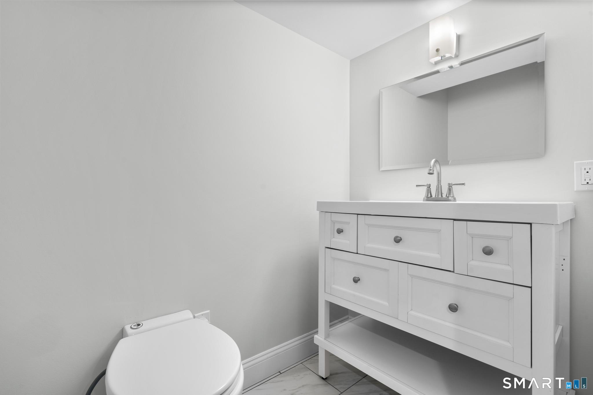 2455 Boston Post Road, Unit A9 Guilford, CT 06437 - Photo 21 of 25 Basement Half Bath