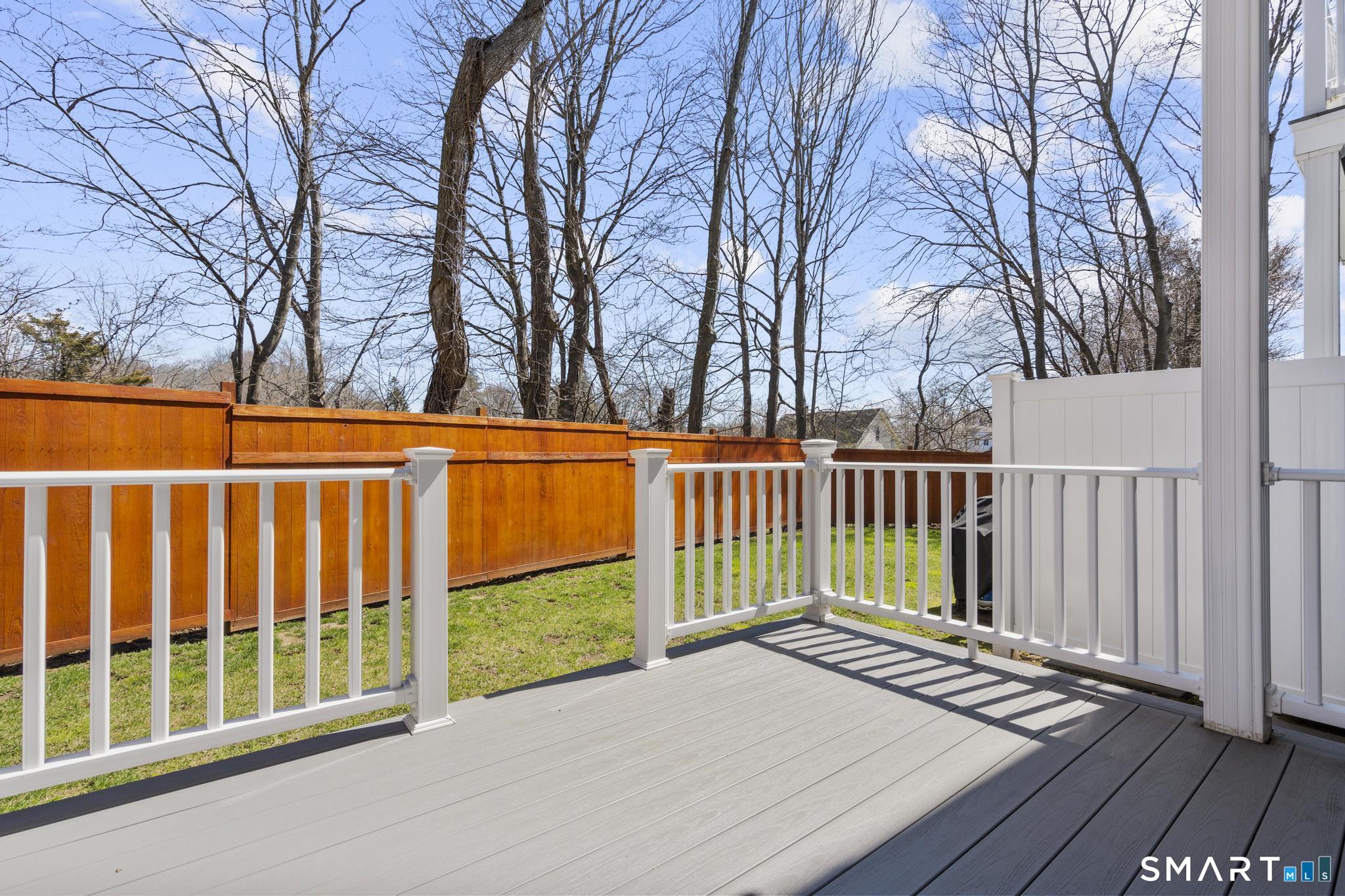 2455 Boston Post Road, Unit A9 Guilford, CT 06437 - Photo 23 of 25 Backyard Private Deck