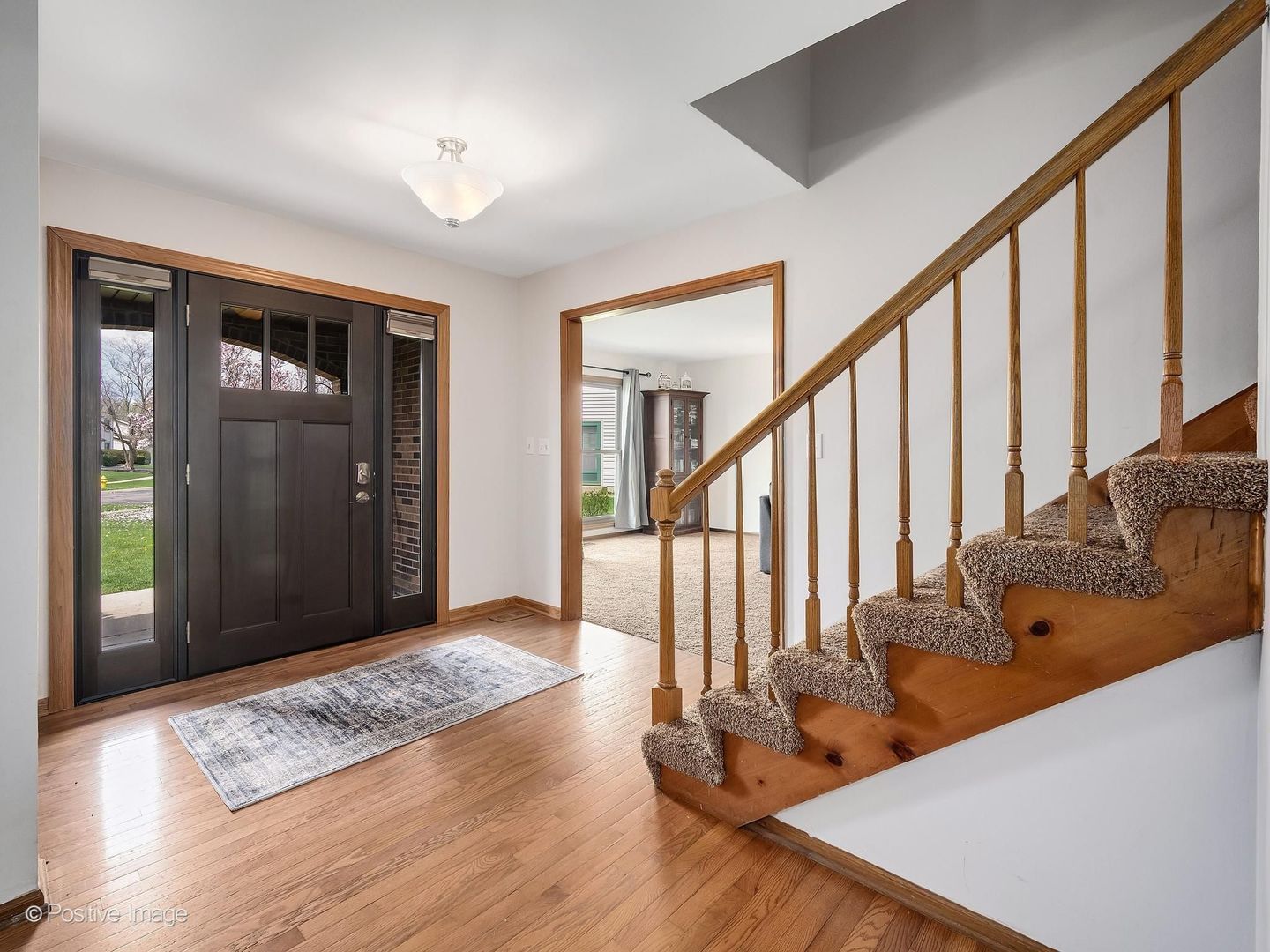 612 Stuart Drive Carol Stream, IL 60188 - Photo 2 of 29 a view of an entryway and wooden floor