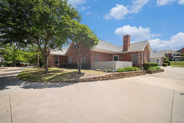 a view of a house with a street