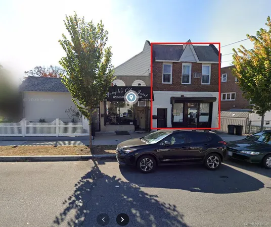 a car parked in front of a house