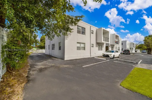 a view of a street with a building