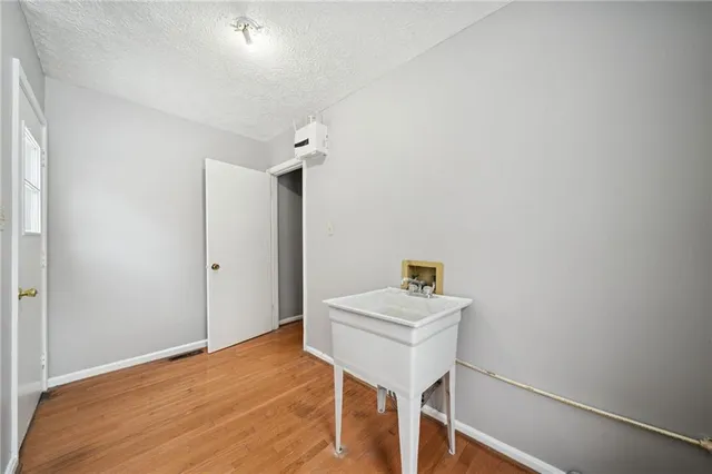a room with a table and chairs