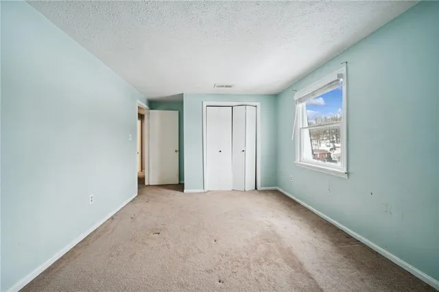 an empty room with windows