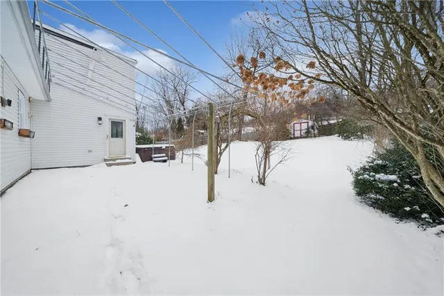 a view of snow on the road