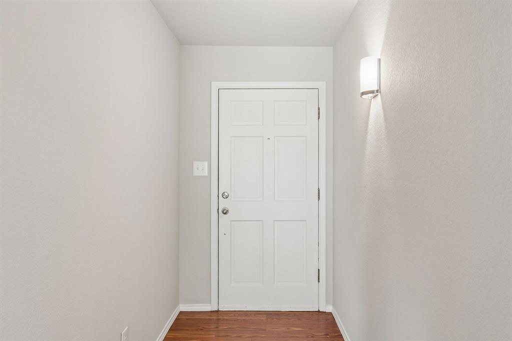 5620 Perrin Street The Colony, TX 75056 - Photo 2 of 31 a view of hallway with closet