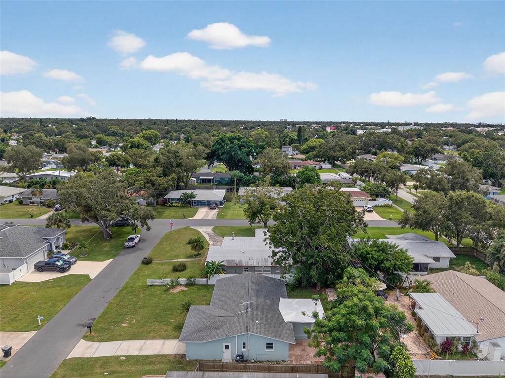 12432 136th Lane Largo, FL 33774 - Photo 54 of 64 an aerial view of a house with a garden