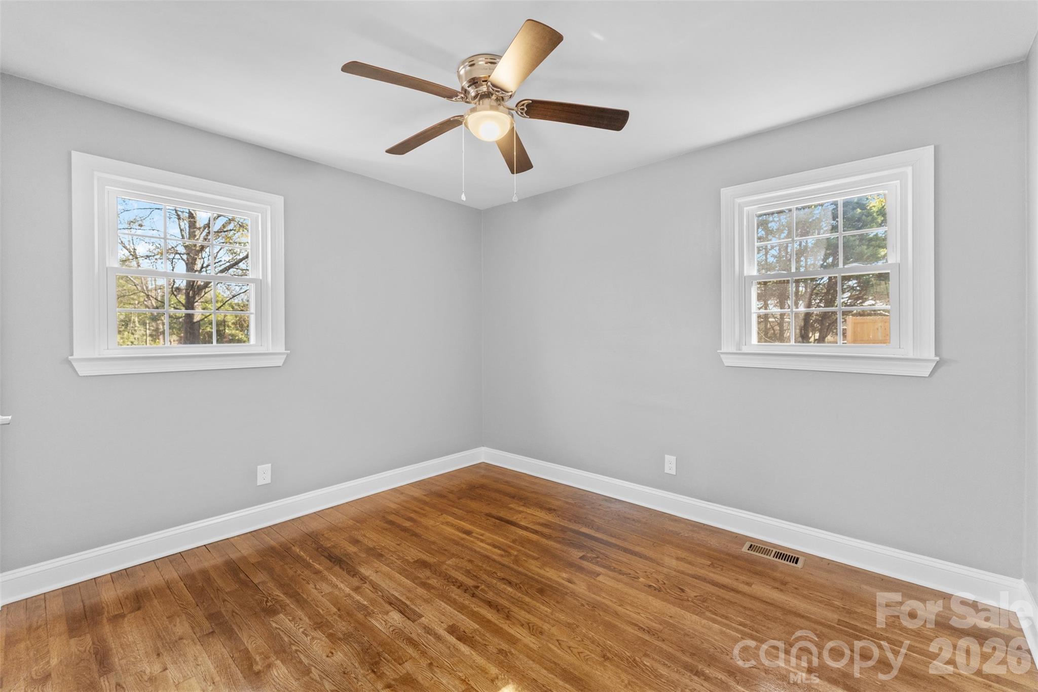 206 Hunter Street York, SC 29745 - Photo 12 of 20 a view of empty room with wooden floor