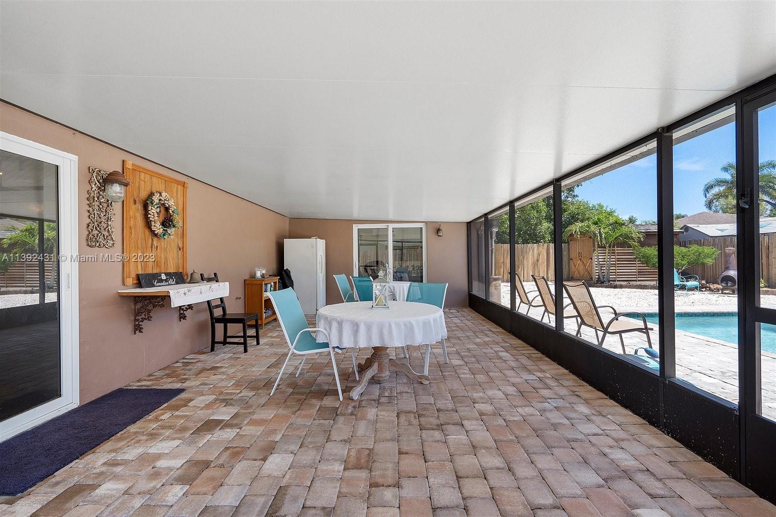 19404 Colorado Circle Boca Raton, FL 33434 - Photo 35 of 62 a living room with furniture and a large window