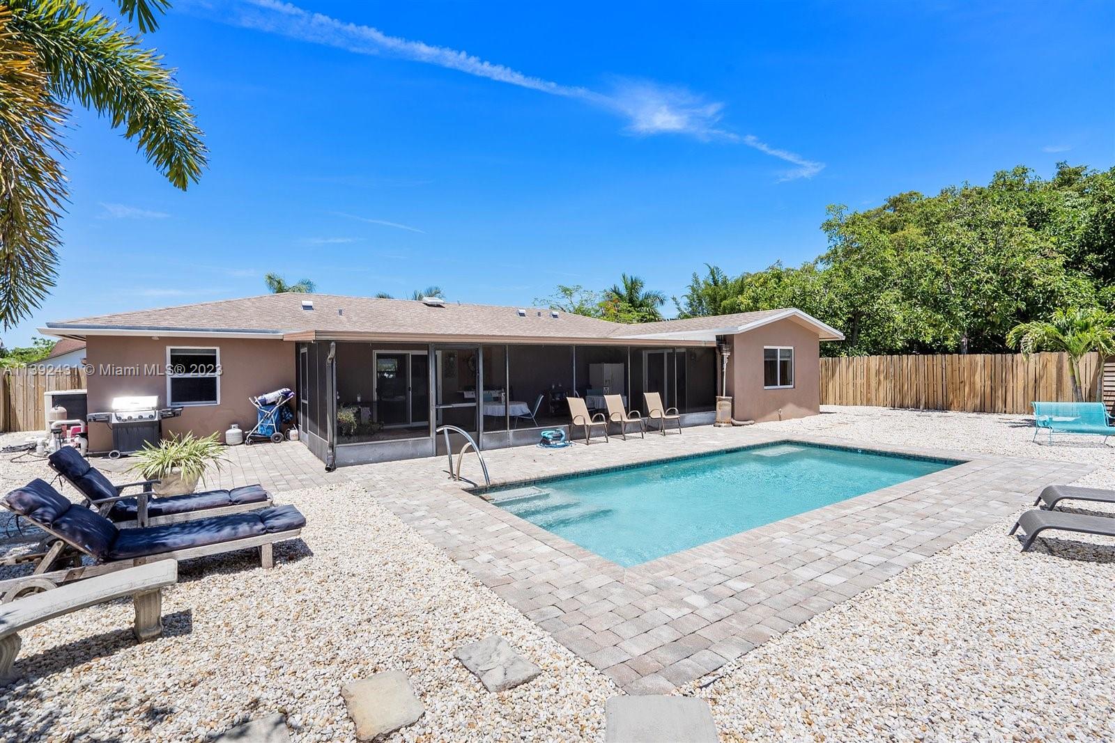 19404 Colorado Circle Boca Raton, FL 33434 - Photo 41 of 62 a view of a house with backyard and sitting area
