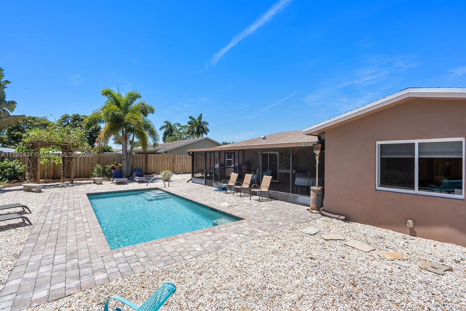 19404 Colorado Circle Boca Raton, FL 33434 - Photo 43 of 62 a view of a house with backyard porch and sitting area