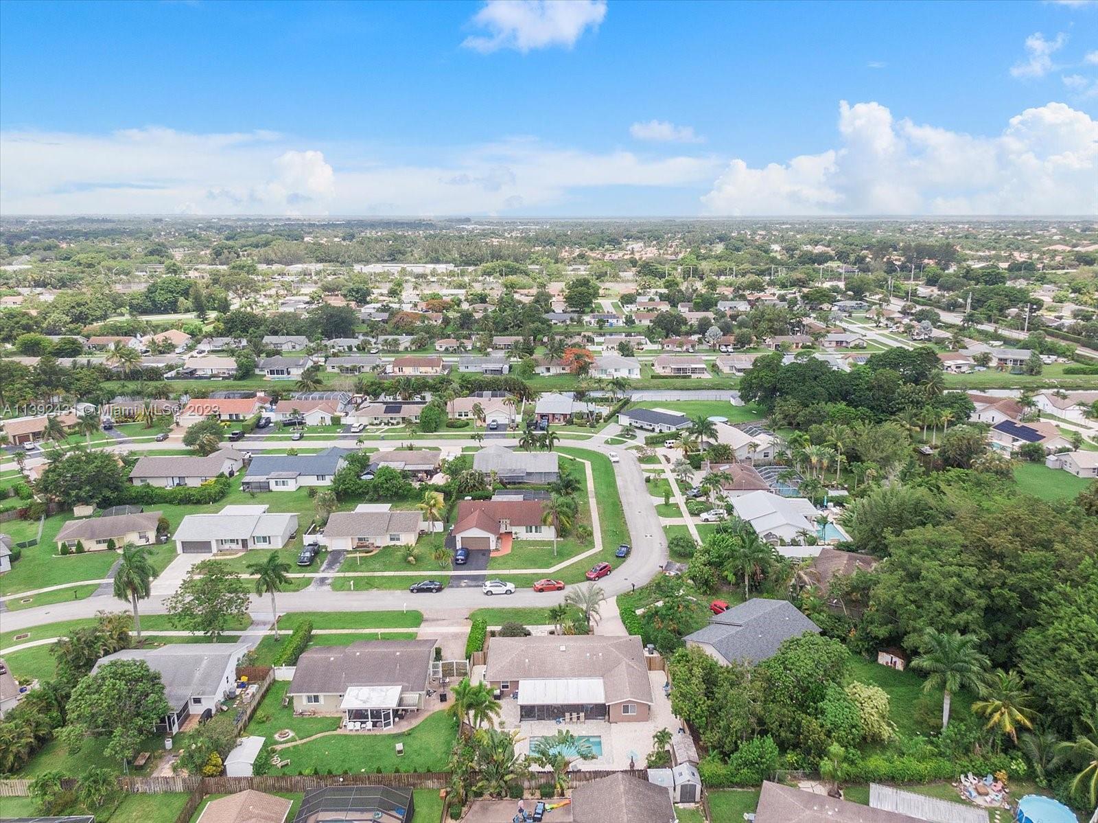 19404 Colorado Circle Boca Raton, FL 33434 - Photo 52 of 62 an aerial view of residential houses with outdoor space and trees