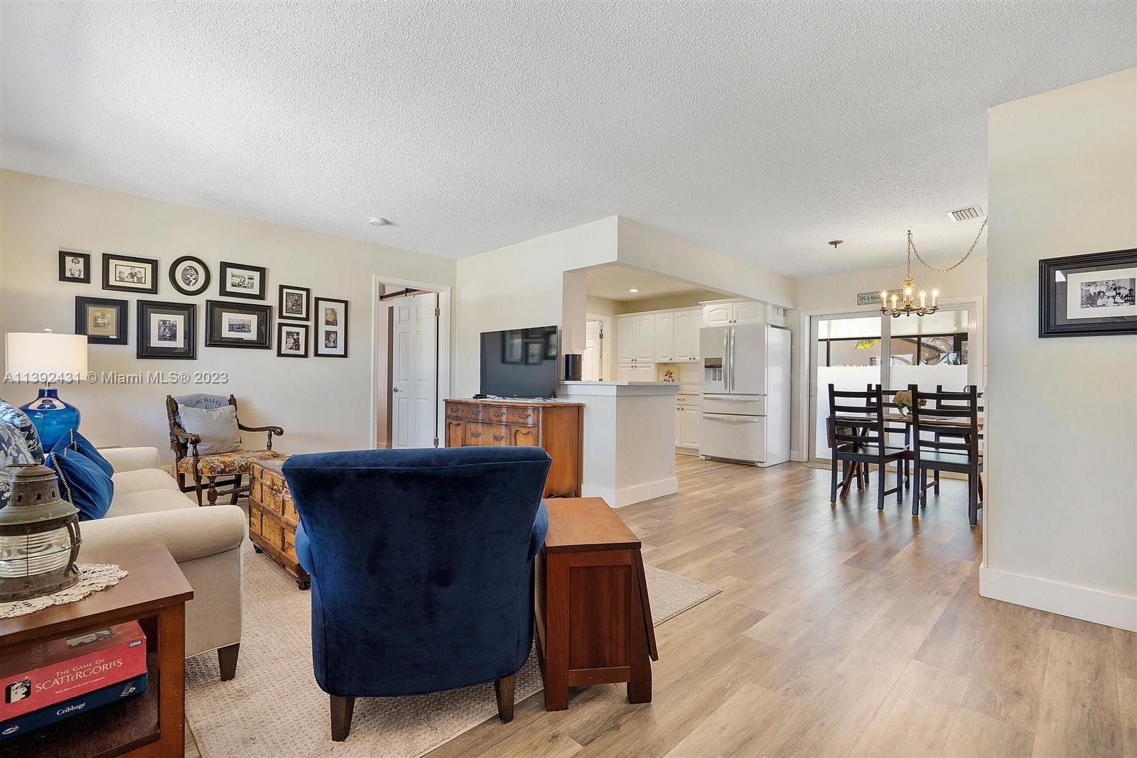 19404 Colorado Circle Boca Raton, FL 33434 - Photo 6 of 62 a living room with furniture and kitchen view