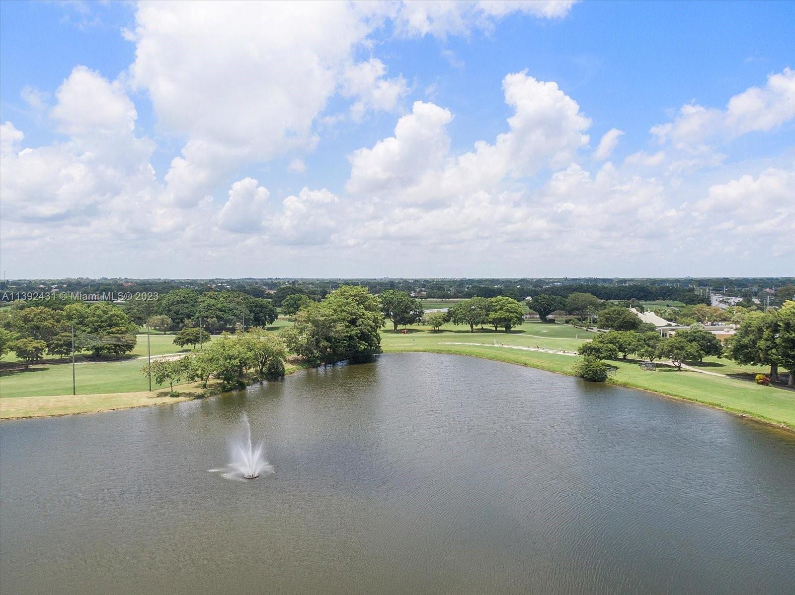 19404 Colorado Circle Boca Raton, FL 33434 - Photo 62 of 62 a view of a lake with houses in the back