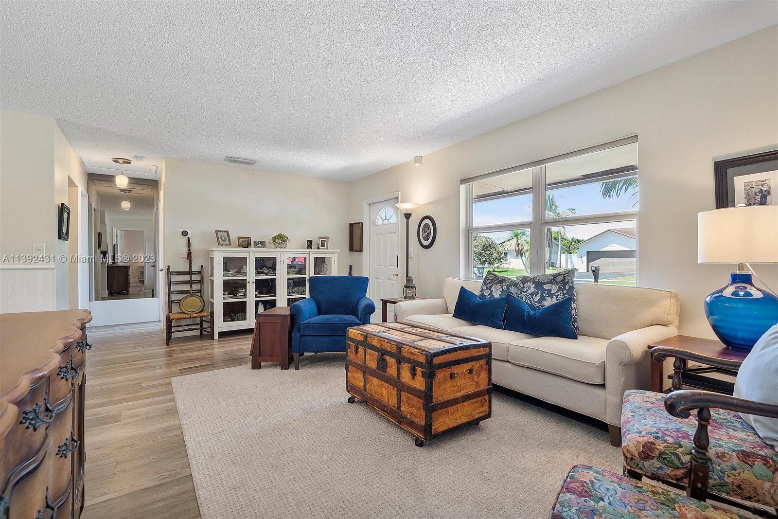 19404 Colorado Circle Boca Raton, FL 33434 - Photo 10 of 62 a living room with furniture and wooden floor