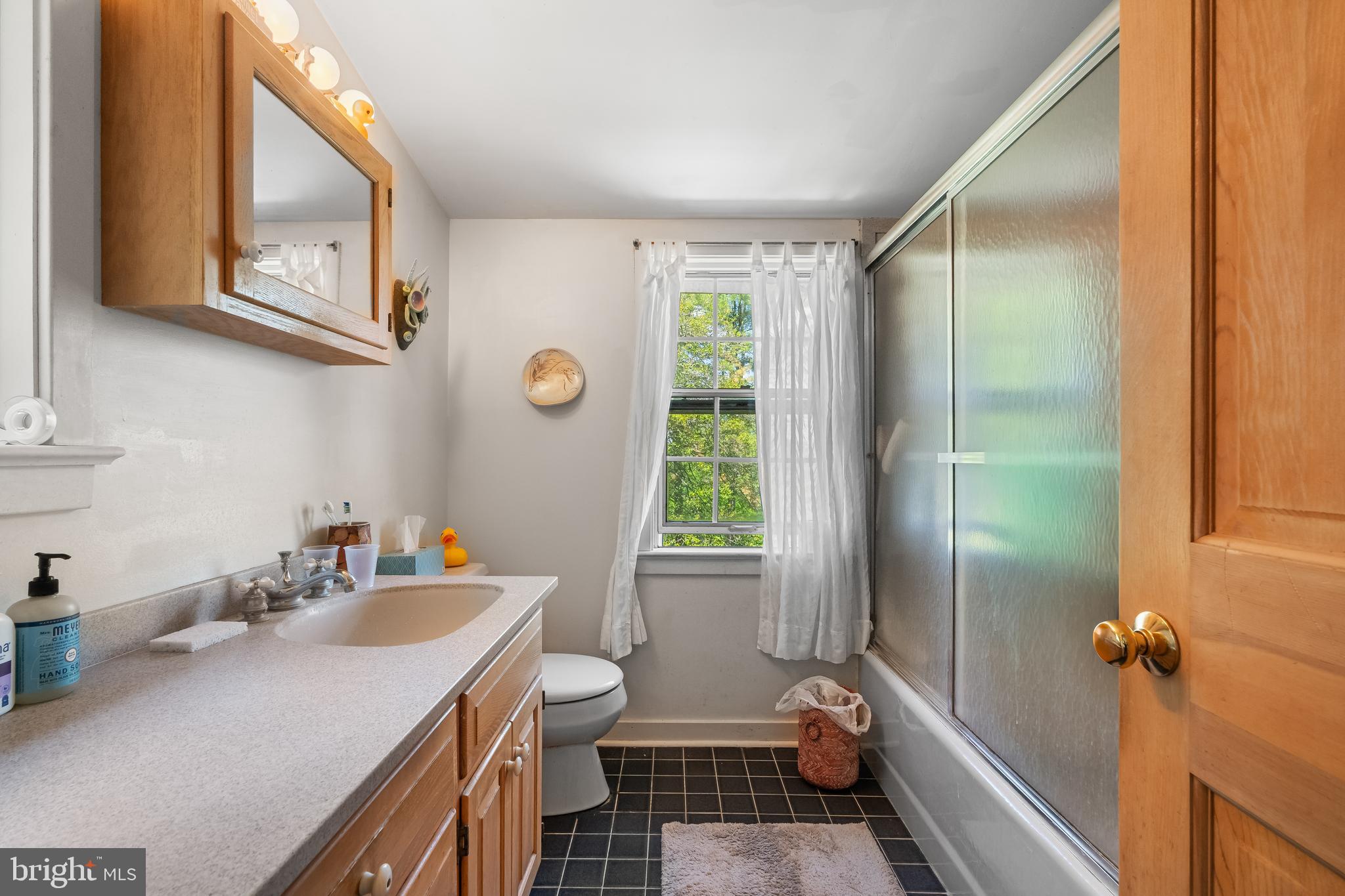 150 Cooks Glen Road Spring City, PA 19475 - Photo 26 of 37 a bathroom with a granite countertop sink a mirror and a shower
