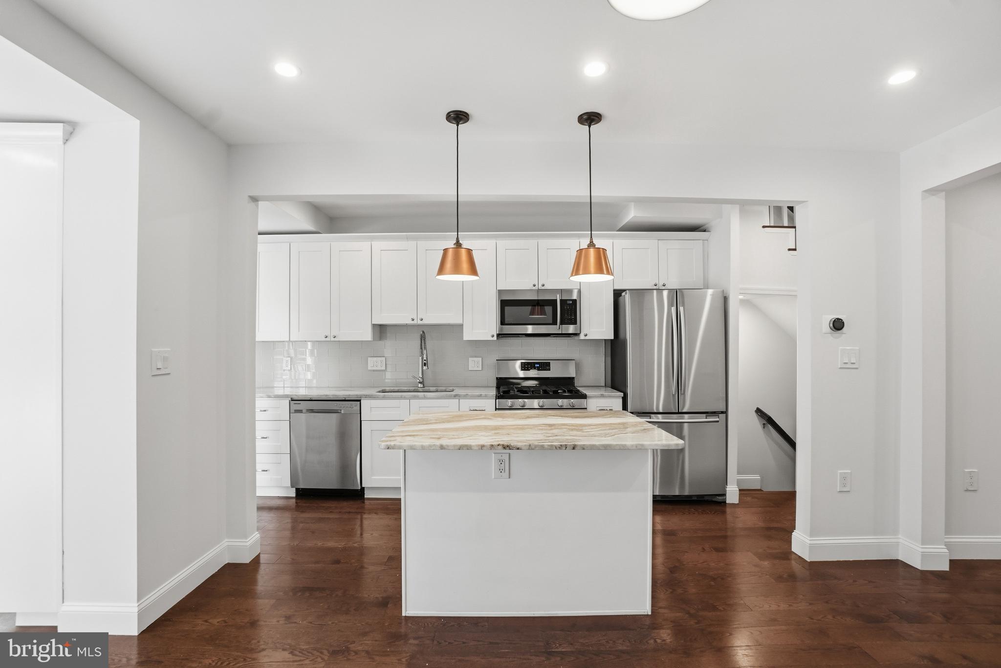 1118 Chicago Street Southeast Washington, DC 20020 - Photo 6 of 27 Modern kitchen with elegant finishes.