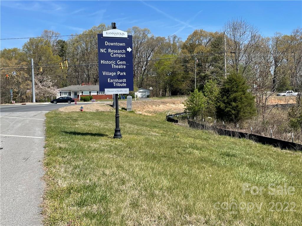 5445 Mooresville Road Kannapolis, NC 28081 - Photo 2 of 14 a view of a street with of houses with outdoor space