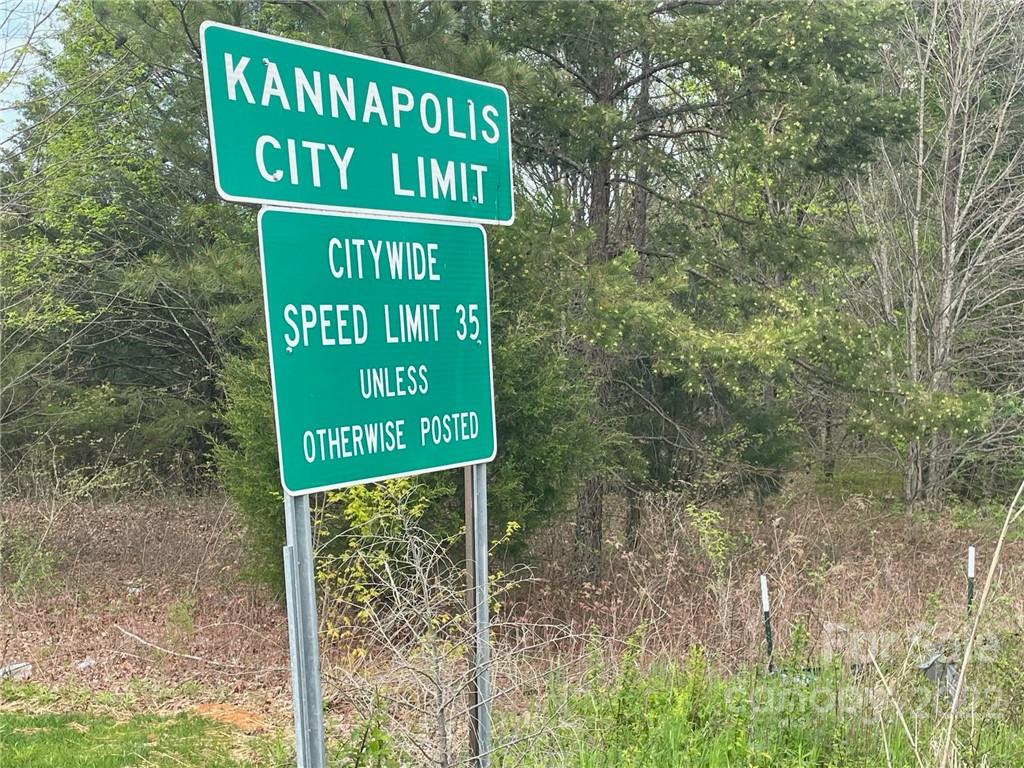 5445 Mooresville Road Kannapolis, NC 28081 - Photo 6 of 14 a sign that is on a pole
