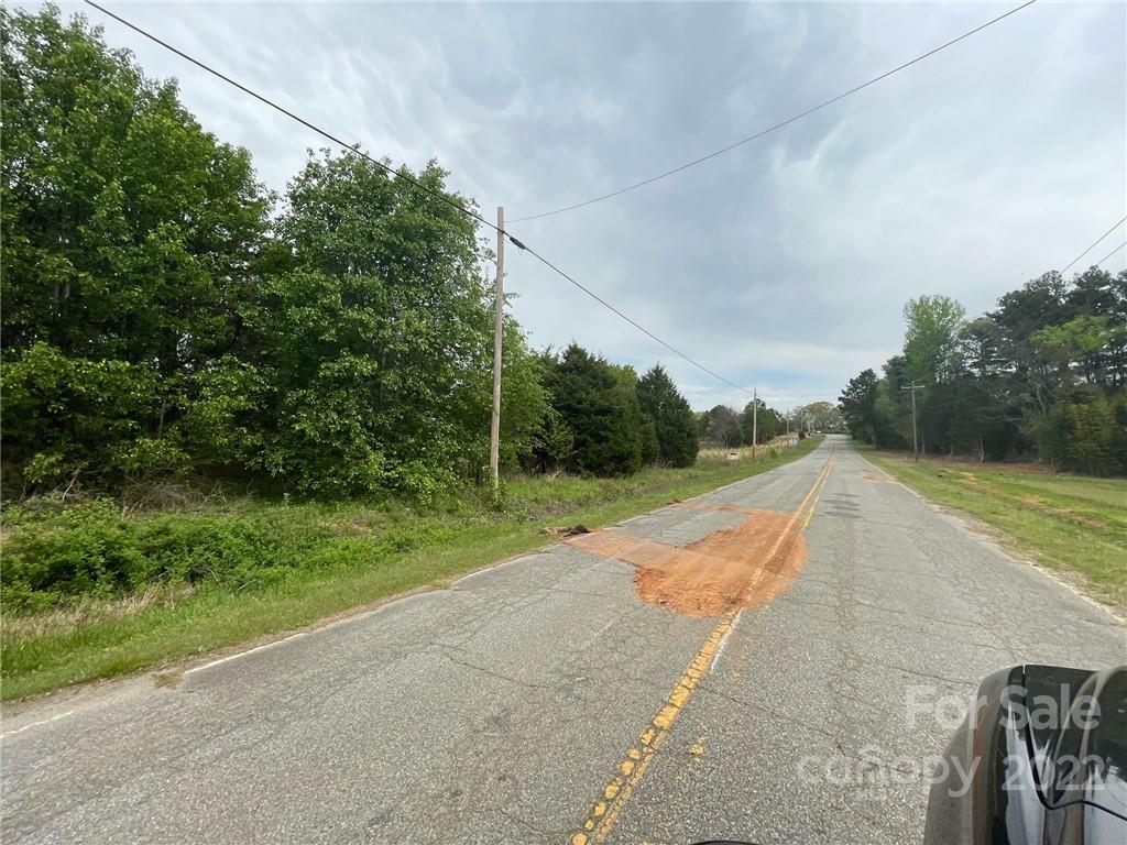 5445 Mooresville Road Kannapolis, NC 28081 - Photo 9 of 14 a view of a yard with potted plants