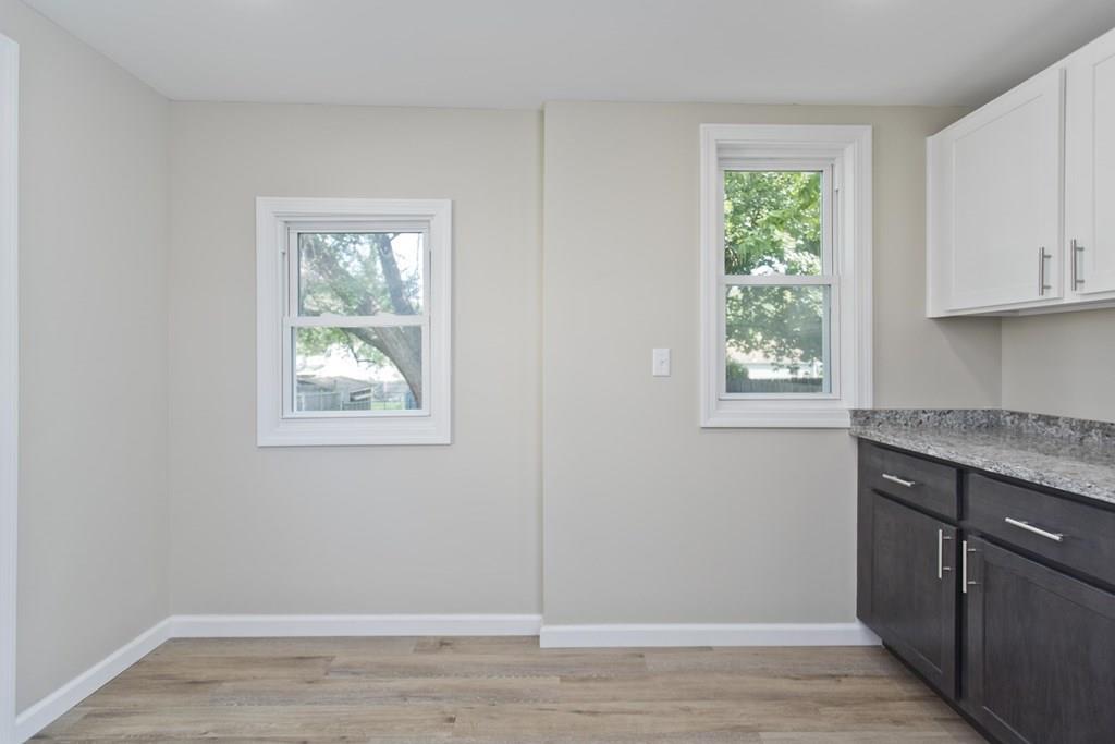 19 Judson Street Springfield, MA 01104 - Photo 32 of 42 a view of a kitchen with wooden floor and fan
