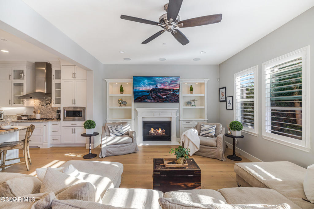 13148 Bent Grass Place Moorpark, CA 93021 - Photo 23 of 76 a living room with furniture fireplace and window