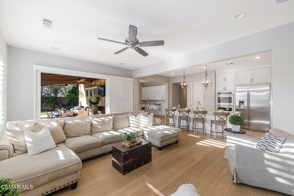 13148 Bent Grass Place Moorpark, CA 93021 - Photo 24 of 76 a living room with furniture and a large window