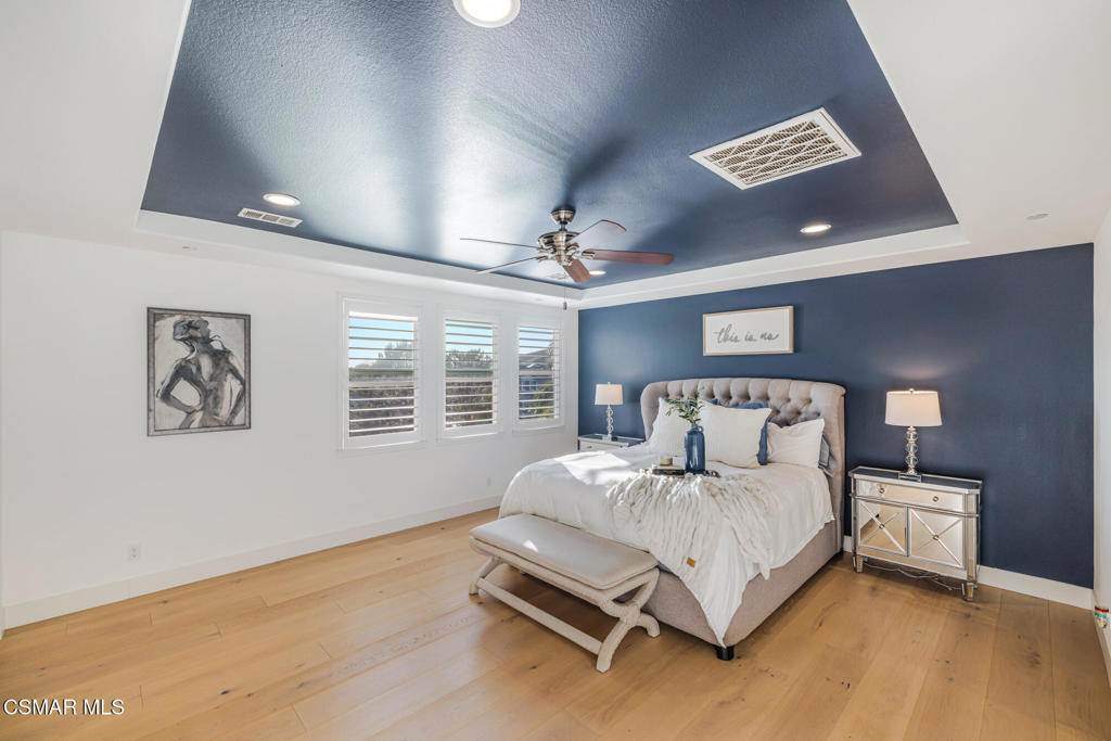 13148 Bent Grass Place Moorpark, CA 93021 - Photo 37 of 76 a bedroom with a bed and a large window