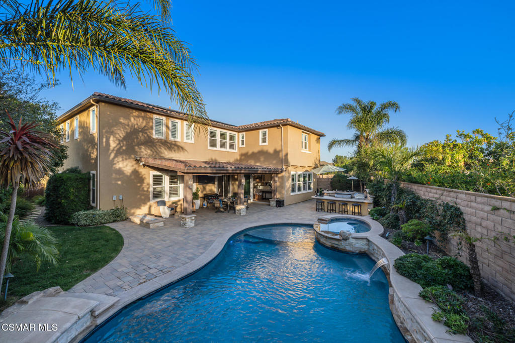 13148 Bent Grass Place Moorpark, CA 93021 - Photo 51 of 76 a view of a house with pool and sitting area