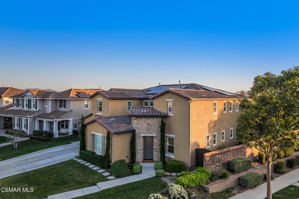 13148 Bent Grass Place Moorpark, CA 93021 - Photo 57 of 76 a front view of a house with a yard