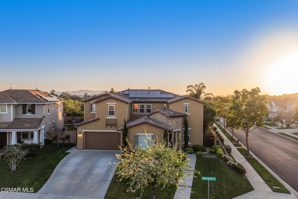 13148 Bent Grass Place Moorpark, CA 93021 - Photo 58 of 76 a view of a big house with a big yard and large trees