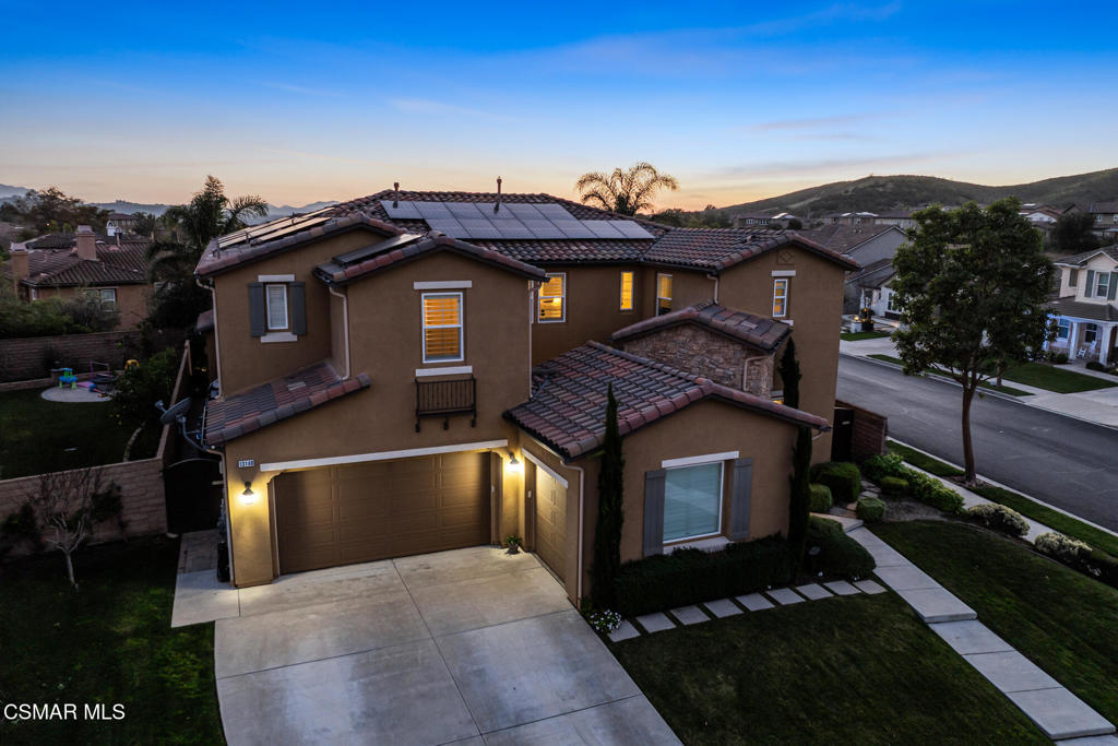 13148 Bent Grass Place Moorpark, CA 93021 - Photo 71 of 76 a front view of a house with a yard
