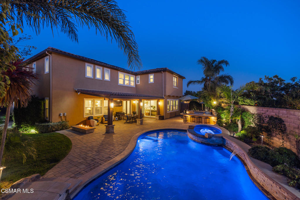 13148 Bent Grass Place Moorpark, CA 93021 - Photo 72 of 76 a view of a house with a swimming pool