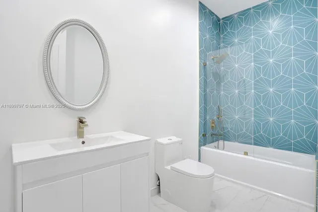 an aerial view of a house with yard swimming pool and outdoor seating