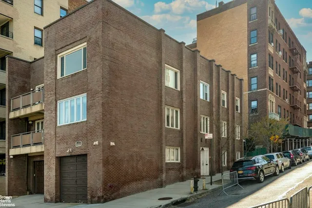a bathroom with a shower and a shower