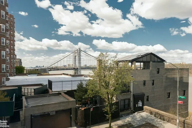 a kitchen with granite countertop appliances cabinets and a sink