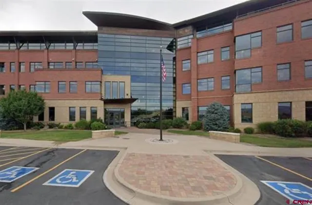 a view of a building with a street