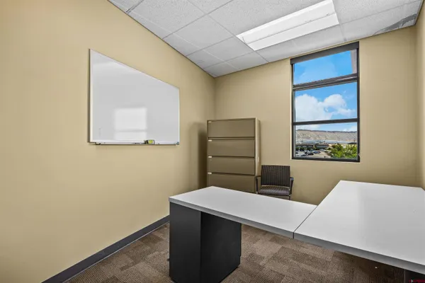 a view of a living room with a hallway