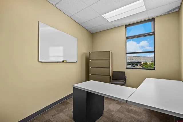 a view of a living room with a hallway
