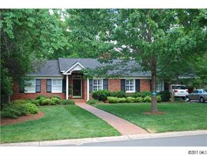 1146 Andover Road Charlotte, NC 28211 - Photo 1 of 13 a front view of a house with a yard and trees