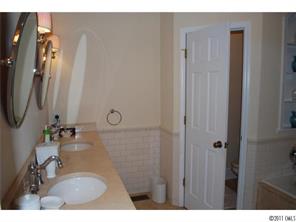 1146 Andover Road Charlotte, NC 28211 - Photo 11 of 13 a bathroom with a sink vanity granite and a mirror